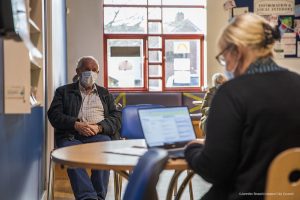 Man with face covering - changes to self isolation