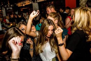 People dancing in a bar