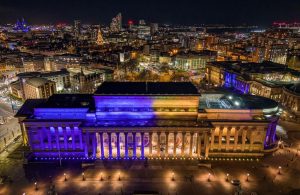 Ariel shot of St George's Hall lit up in the colours of the Ukrainian flag courtesy of Stratus Imagery