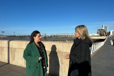 Sue Gibson (Right) chats to colleague Kate Gilston on Liverpool's Pier Head