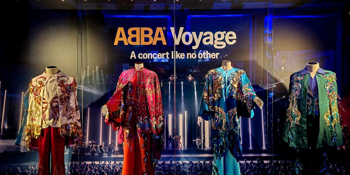 Image of ABBA outfits on display