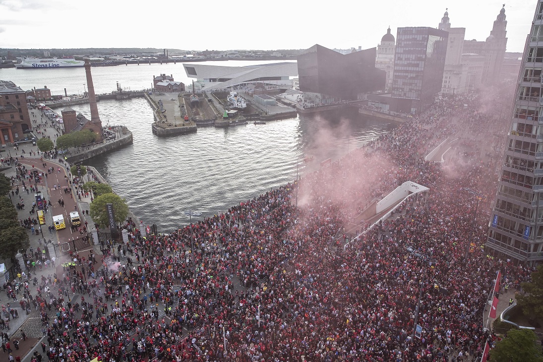 Thousands of people line The Strand for the LFC Victory Parade