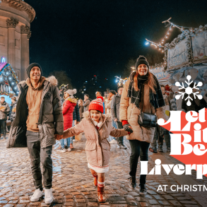 three people walking at Liverpool Christmas Market