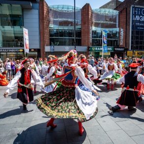 People dancing on the pavement