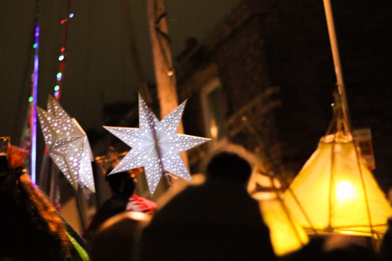 Lit lanterns hanging down