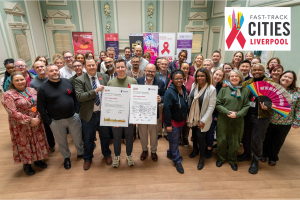Group photo holding the pledge