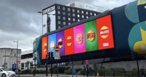 Walkers crisps advertising on side of Liverpool St John's building