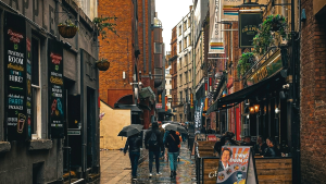 People walking down Mathew Street in Liverpool